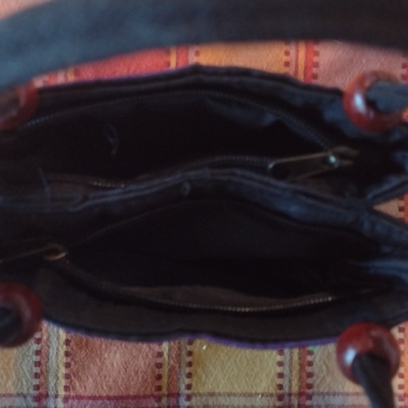 This is a cute little multicolor mini purse with purple flowers. - Picture 3 of 3